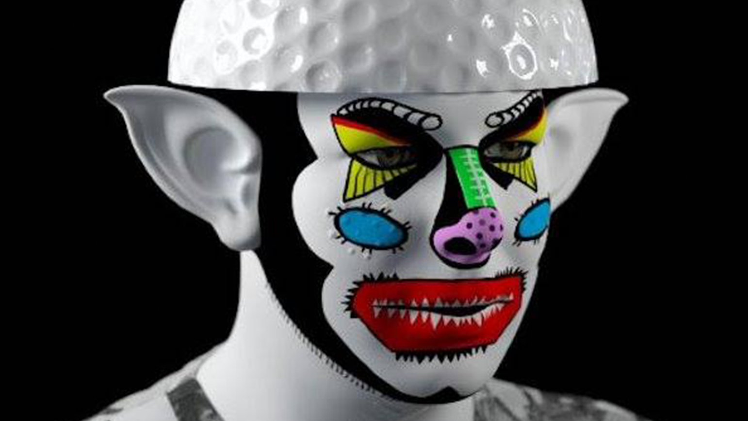 Digital image of a person with garish clown makeup