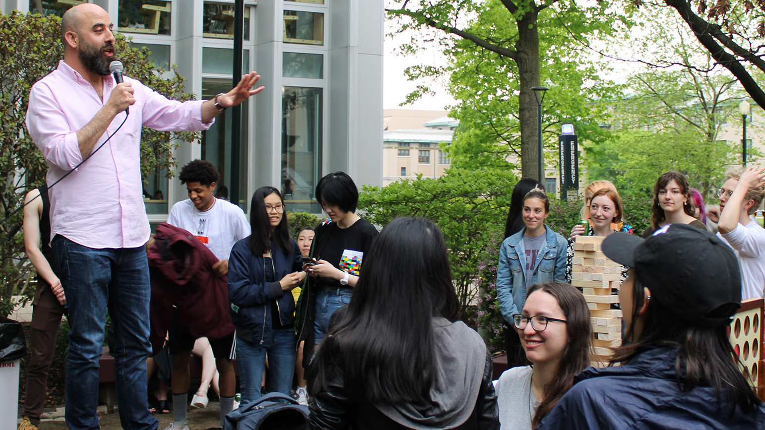 Charlie White speaking to a group of students outside