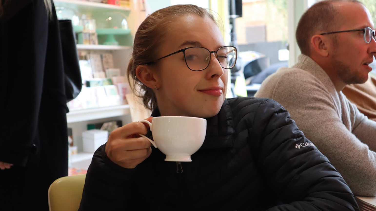 Headshot of Lumi Barron with a cup of tea