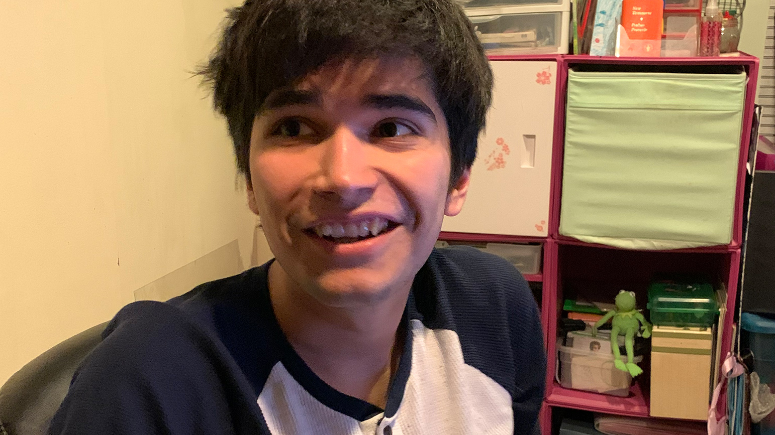 Headshot of Peter Sheehan sitting at his desk